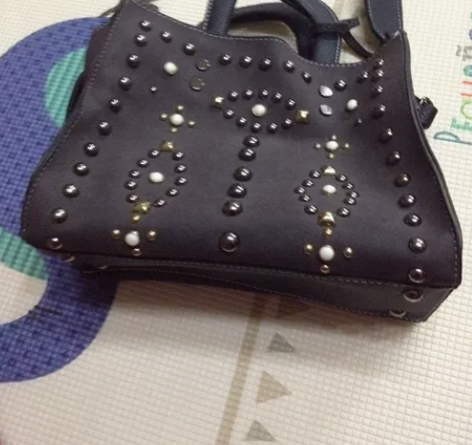 个人转  真皮女包 9.9新 是买来闲着没...