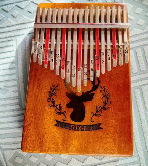 17音卡林巴拇指琴桃花芯木 感兴趣的话点“...