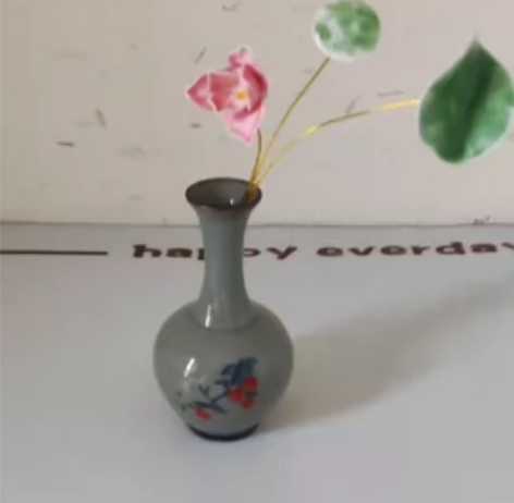 去江西景德镇买的，花也是陶瓷的，闲置在家 ...