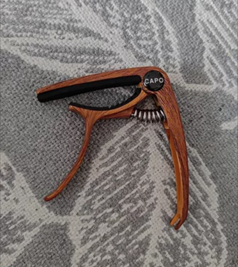 琴行转让升级款锌合金民谣吉他变调夹电木吉他...