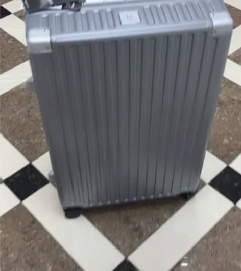 28寸漫游太空银 美国拓尔本静音万向轮 里...