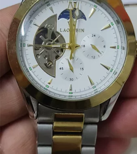 罗宾尼全自动机械表！间金色大气表头，走时正...