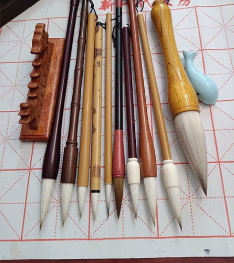 清库存，十支毛笔68元，如果要加上龙头笔搁...