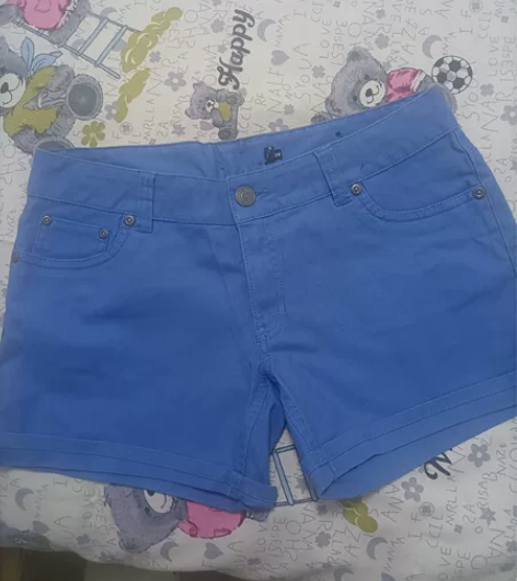 全新蓝色牛仔短裤,二尺二的实物比这个蓝点,...