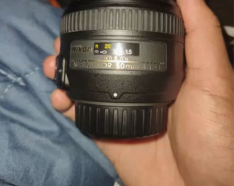 出一个原厂尼克尔50mm f1.4g全画幅...