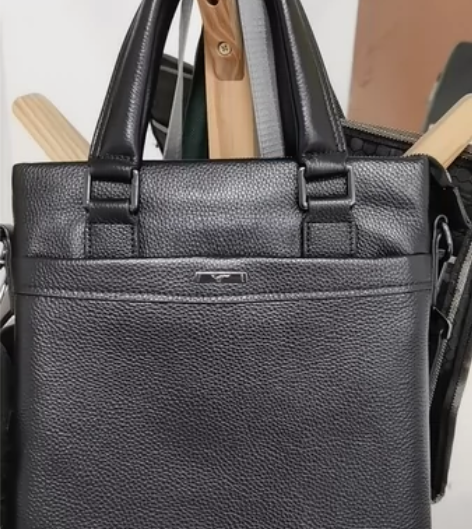 七匹狼男包商务公文包真皮男士皮包手提包坚款...