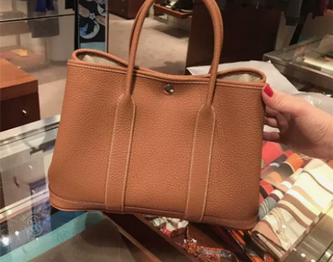 2022新款真皮女包单肩斜跨托特包百搭花园...