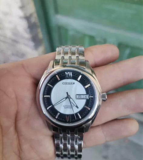 西铁城手表，全自动机械表，日历正常，星期正...