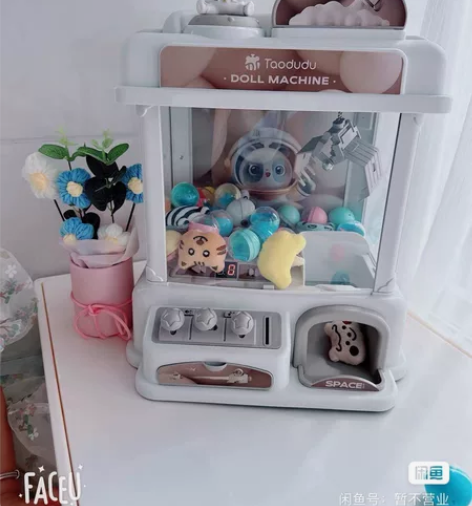 2023年新款大号抓娃娃机儿童玩具夹公仔扭...