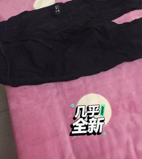 黑色休闲运动裤男生女生都可以穿束脚的面料比...