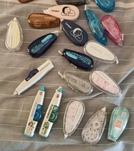 出修正带,有的里面是满的,有的里面是空壳,...