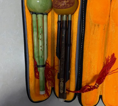 葫芦丝 木头那个放着太干燥有一条裂缝  便...