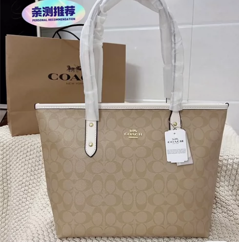 闲置二手蔻驰Coach女士老花满印拉链托特...