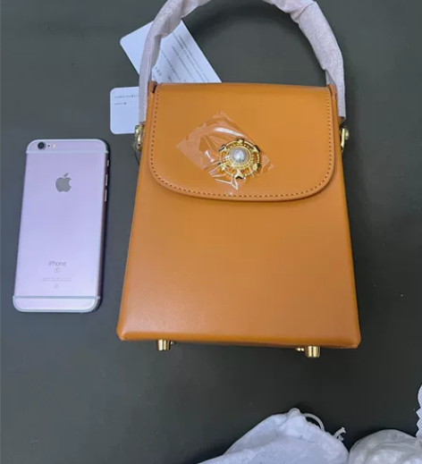 纽芝兰女包斜挎包包姜黄色 官方旗舰店购入全...