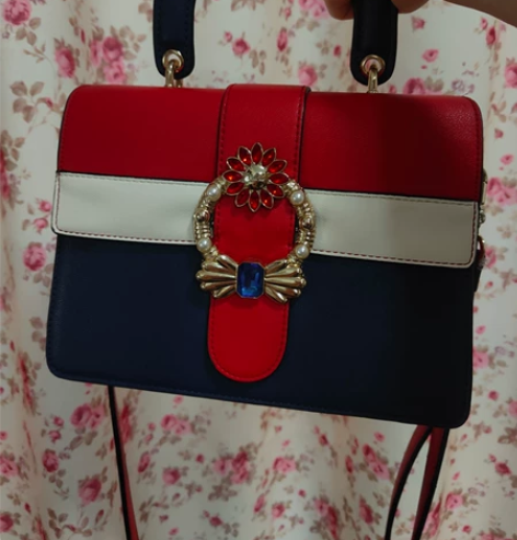 欧时纳包包女2021新款撞色时尚手提包单肩...