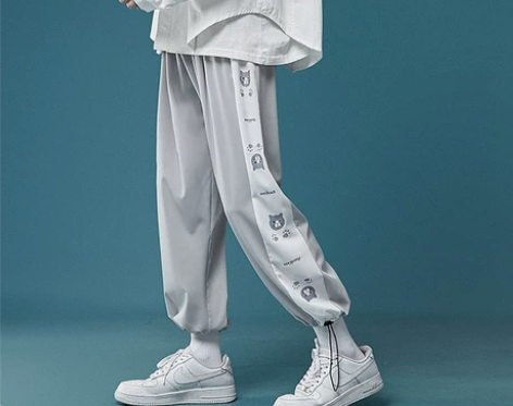 休闲裤女夏卡通印花冰丝薄款束脚哈伦裤阔腿显...