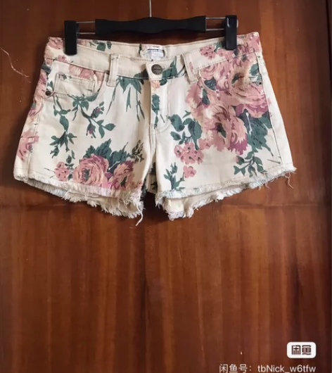 包邮设计感别致碎花流苏牛仔短裤女夏季新款小...