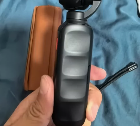 橙影手持摄录机，我也不知道是几代，好像是2...