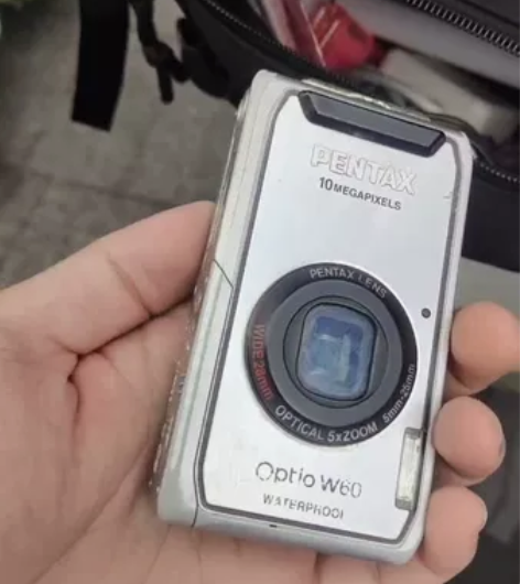 宾得w60，功能正常，成色如图，轻微暗角?...