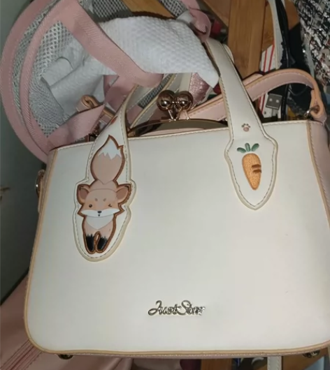 欧时纳小狐狸甜美可爱2用子母包，里面还有一...