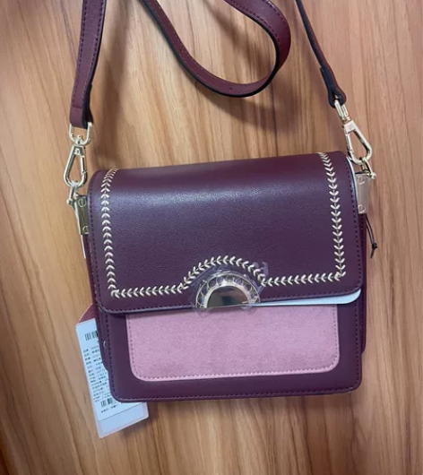 纳兰杜包包，单肩包/斜挎包、容量挺大，牛皮...