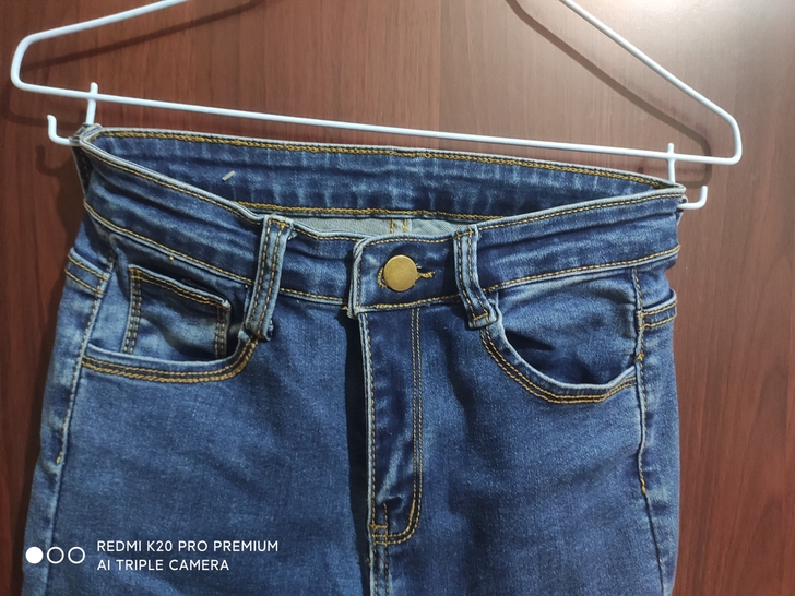 S码不规则破洞牛仔裤女