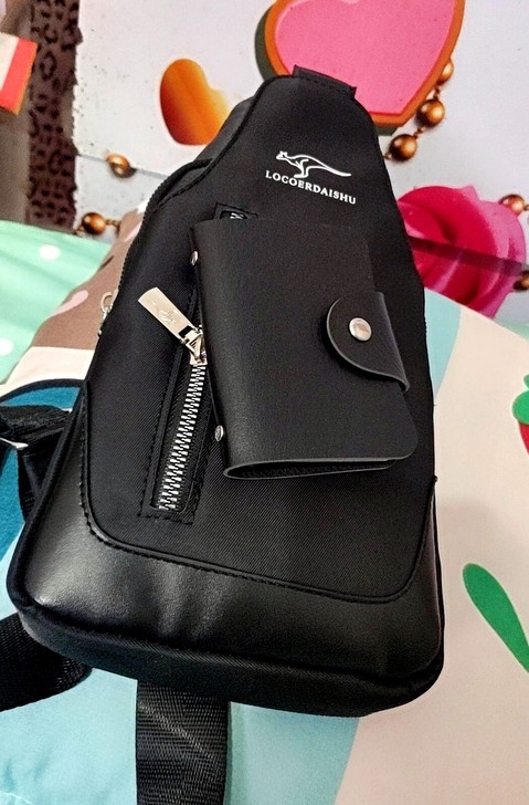 出个全新闲置男士斜挎包包,公司做活动送客户...