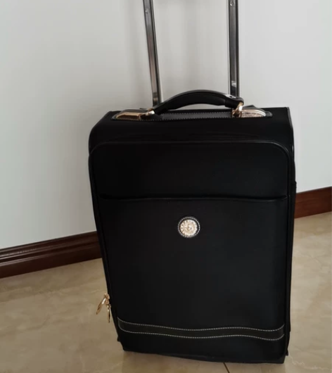 17寸拉杆箱，ousomilo品牌，九成新...