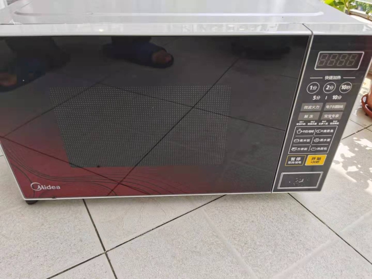 美的微波炉，公司抽奖礼品，就刚开始用了四五...