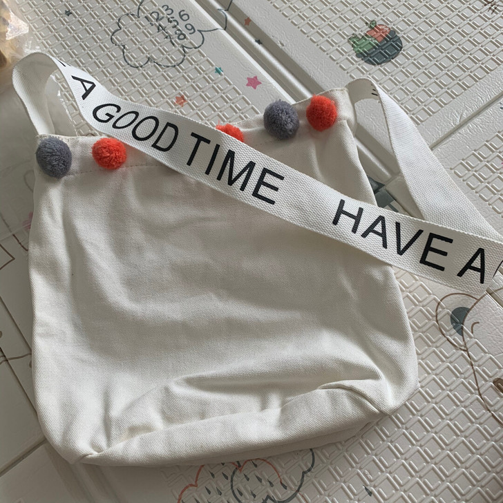 韩代字母毛球帆布包