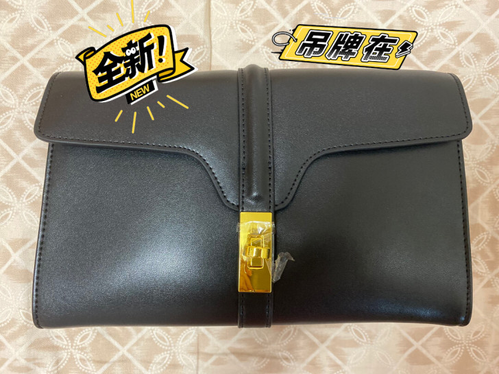 黑色真皮牛皮小方包旋转扣单肩斜挎包，两条肩...