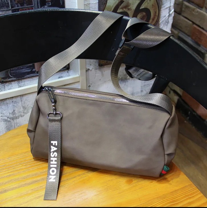 磨砂皮质斜挎包潮牌男士单肩包圆筒包