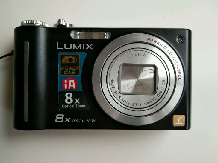 松下数码相机DMC-ZR1九成新，配件原装...