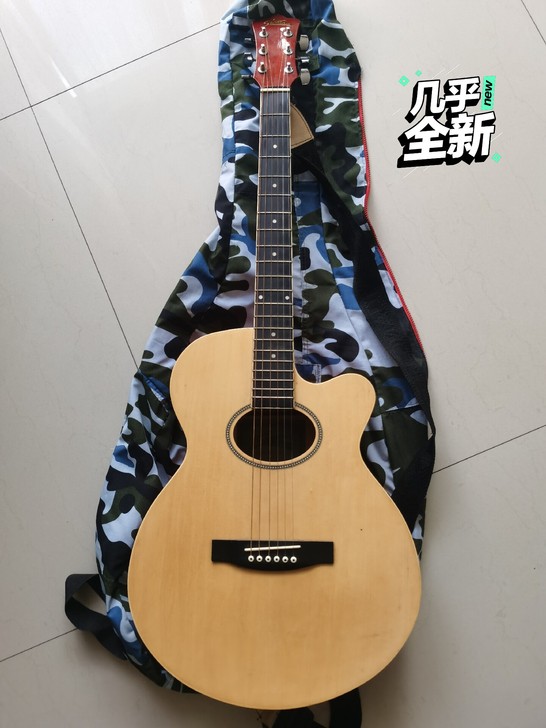 学吉他用的 买了新的这个转出 几乎全新 刚...