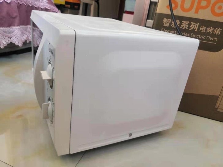 美的微波炉九成新，同城可送货上门，基本没用...