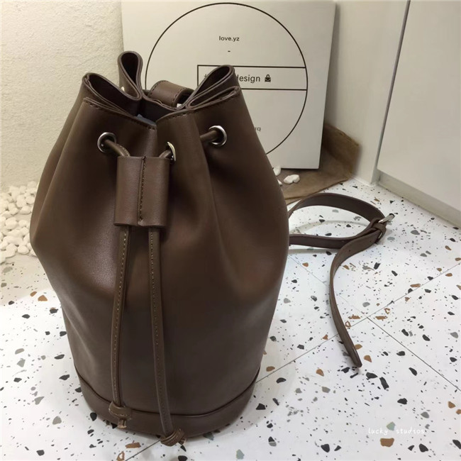 lucky韩版新款抽绳水桶包女小众复古通勤...