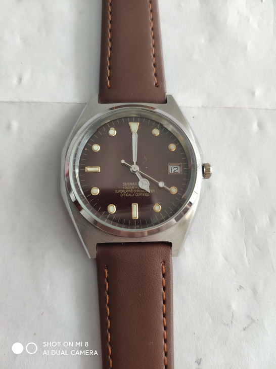 转让一块全新的闲置，不锈钢外壳，带日历石英...