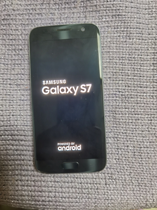 三星galaxy S57型号：SM-G93...