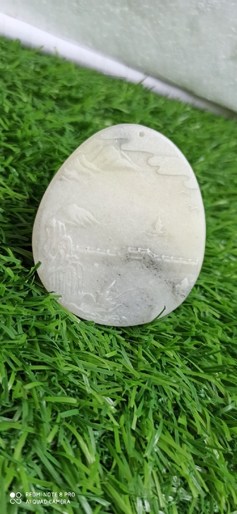 和田玉雕刻的山水画入手渠道：在古玩市场淘的，