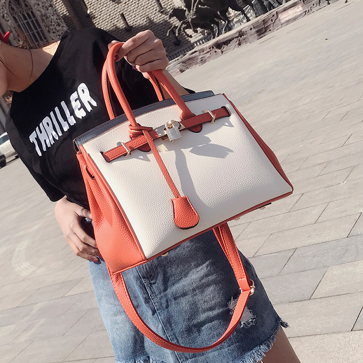 大包包女2021流行新款潮撞色大容量手提包...