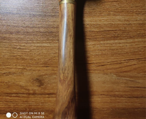 在我手里有三四年了，两把纯实木烟斗，一把黄...