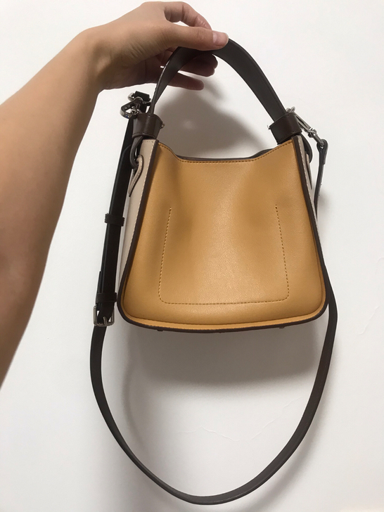 棕土黄牛皮水桶单肩包手拎包，吸铁磁扣，内搭...