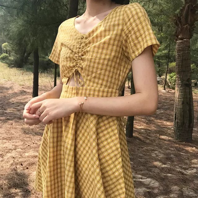 露腰文艺黄色格子复古甜美设计感小心机V领连...