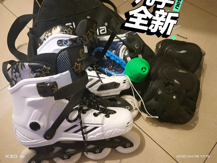 一双39码的轮滑鞋，只穿过一两次，有护具是...