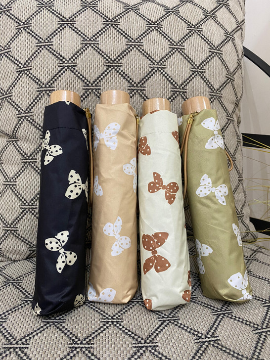 日本蝴蝶结折叠伞，木头手柄，有黑胶涂层，晴...