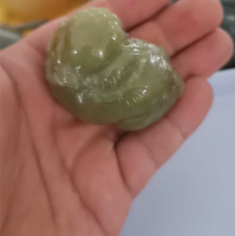 玉雕狮子狗 和田老黄玉 感兴趣的话点“我想...