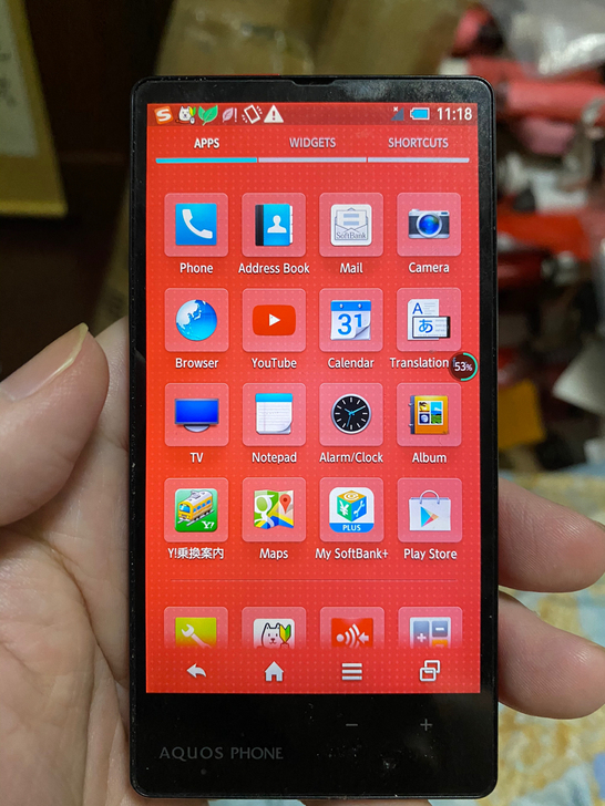 整理房间找出来一个手机,貌似是夏普303S...