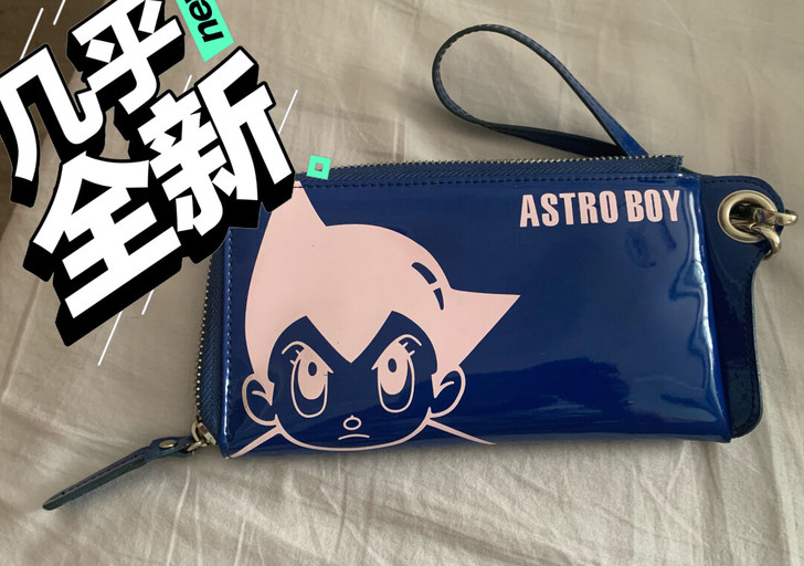 多年前专柜买的阿童木小包包，小票包装早丢了...