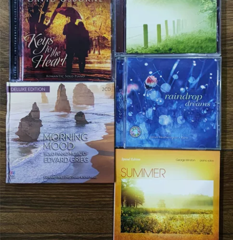 出一套欧美原版抒情音乐CD,共5张,有意可...