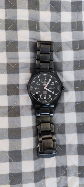 精工5号,光明战将,钢带。几年前买的,好长...